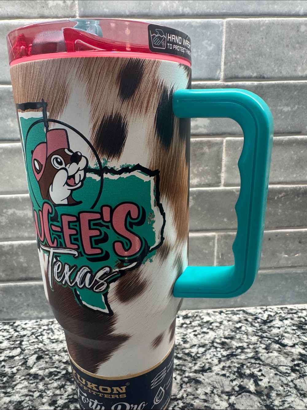 Buc-ee’s Texas Cowhide 40 oz Yukon Outfitters Tumbler with Handle - Picture 2 of 11